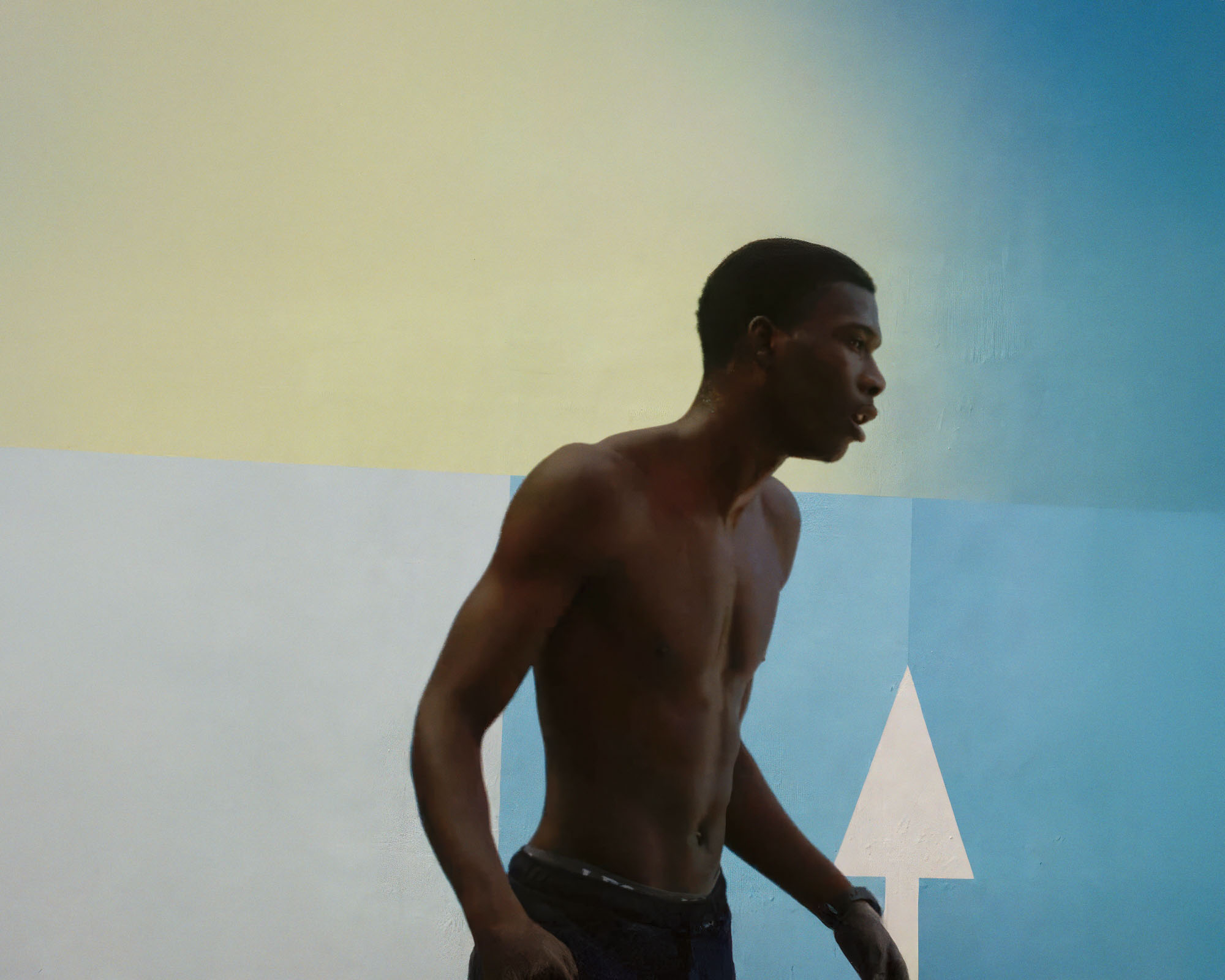 http://An%20athletic,%20shirtless%20Black%20basketball%20player%20stands%20in%20profile%20against%20the%20iconic%20color-blocked%20wall%20of%20the%20Pigalle%20court%20in%20Paris.%20The%20background%20is%20composed%20of%20yellow%20and%20blue%20sections,%20with%20a%20white%20arrow%20pointing%20upwards.%20ben%20stockley,%20ben%20stockley%20photography,%20ben%20stockley%20filmmaker,%20stockley,%20ben%20stockley%20london,%20photographer,%20photography,%20editorial,%20art,%20commercial,%20advertising,%20awards,%20gallery,%20visual%20artist,%20short%20film,%20cinematic,%20documentary,%20basketball,%20Paris,%20Pigalle,%20streetball,%20community,%20friendship,%20youth%20culture,%20sports%20documentary,%20energetic,%20vibrant,%20authentic,%20brotherhood,%20urban,%20directorial%20work,%20slow%20motion,%20sun%20flare,%20storytelling,%20branded%20content